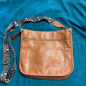 Lularoe crossbody like new. Leopard print adjustable strap.